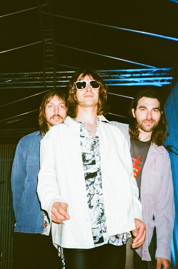 The band under the stage truss, shot on film
